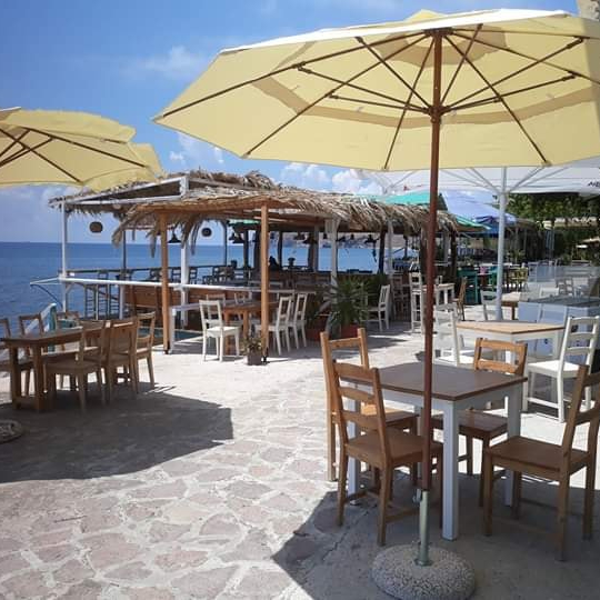 Ohana Saloon: Where Hospitality Meets Authenticity Experience true LGBTQ+ hospitality at Ohana Saloon, a unique waterfront venue along the stunning blue Aegean. As part of the Ohana Collective Lesbos, this space embodies the spirit of family, inclusivity, and self-expression. Join proprietor Michelle and her devoted team, for a scrumptious breakfast or brunch, or explore a menu of locally sourced, organic dishes served throughout the day. Pair your meal with carefully selected local wines or exotic cocktails as you soak in the beautiful surroundings. Ohana Saloon welcomes you year-round, inviting you to cosy evenings by the fire and a range of LGBTQ+ friendly events. Discover a welcoming atmosphere where authenticity and relaxation reign supreme. Follow Ohana Saloon on Facebook for updates and events.